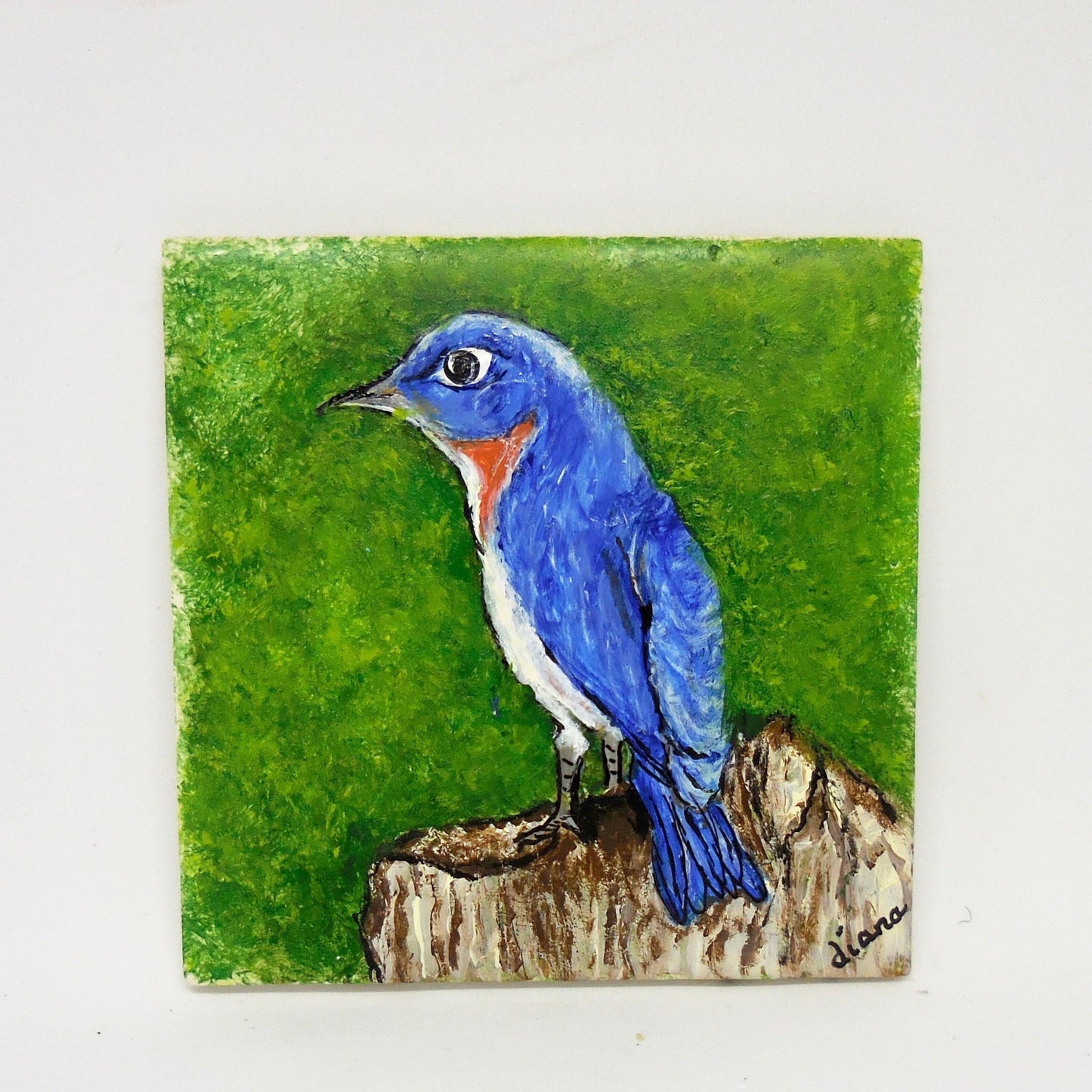 ceramic tile with blue hummingbird
