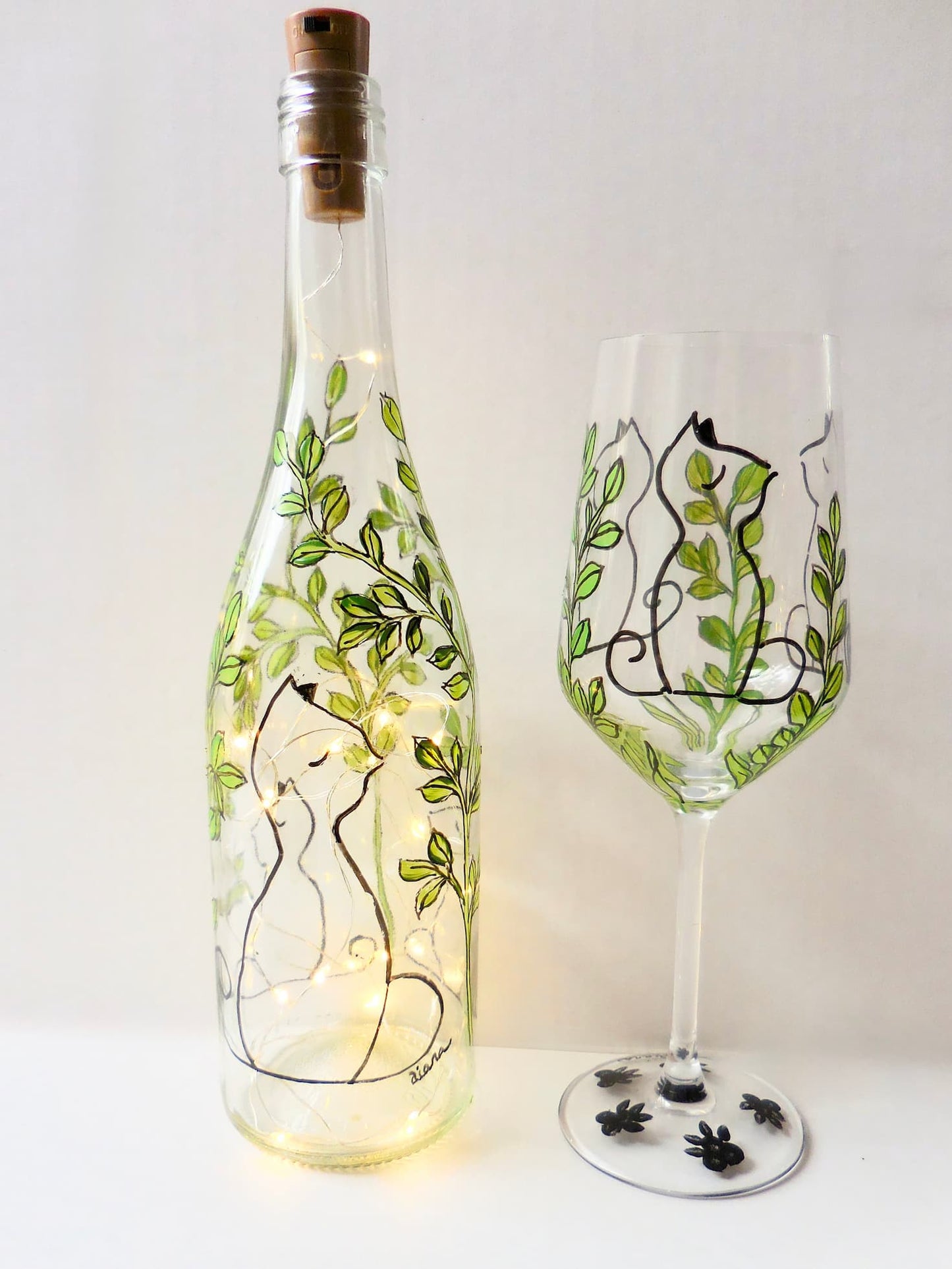 Aloof Cat in Leaves Lighted Wine Bottle