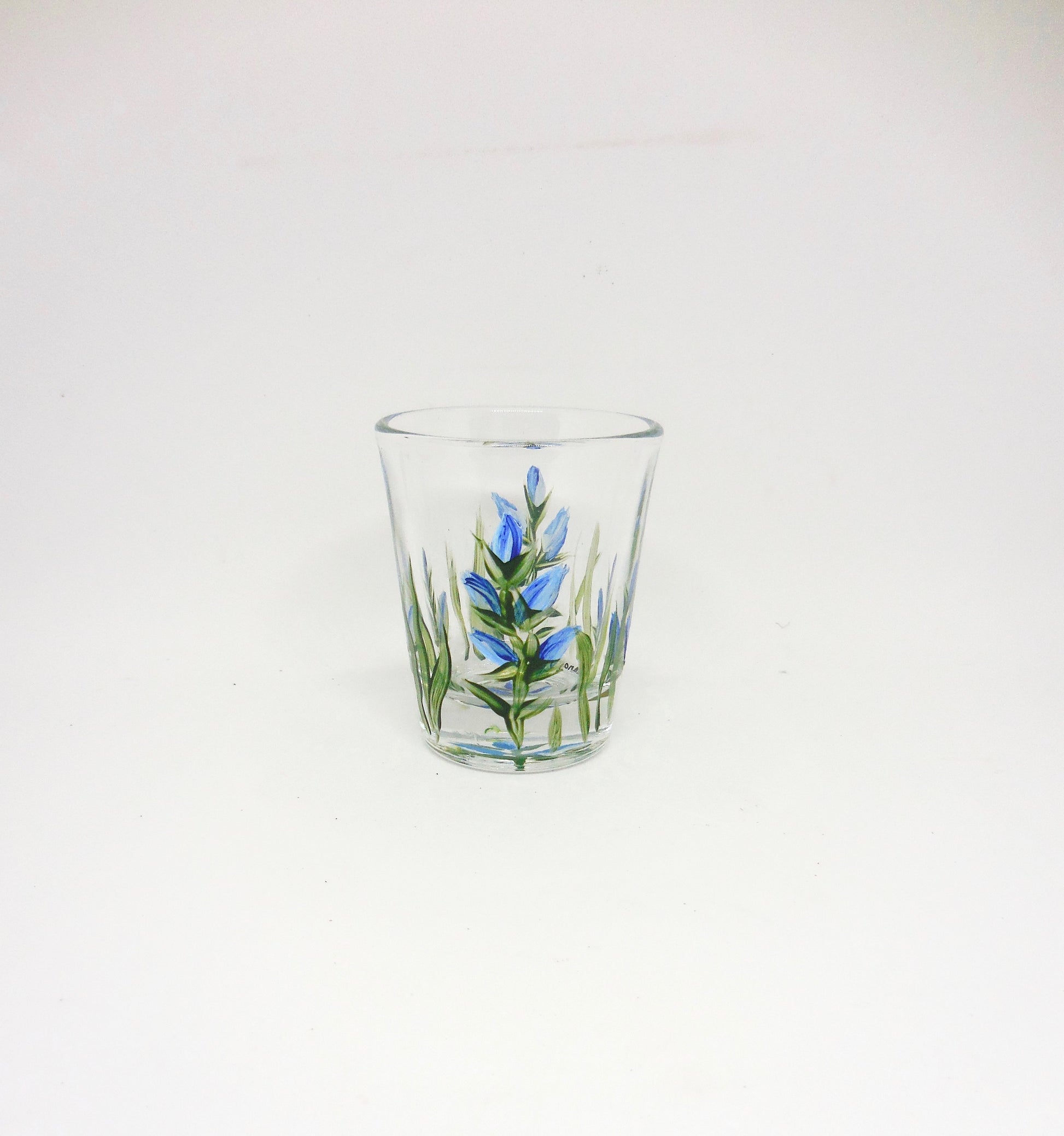 shot glass with bluebonnets design