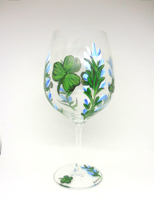 wine glass with bluebonnets and shamrocks design