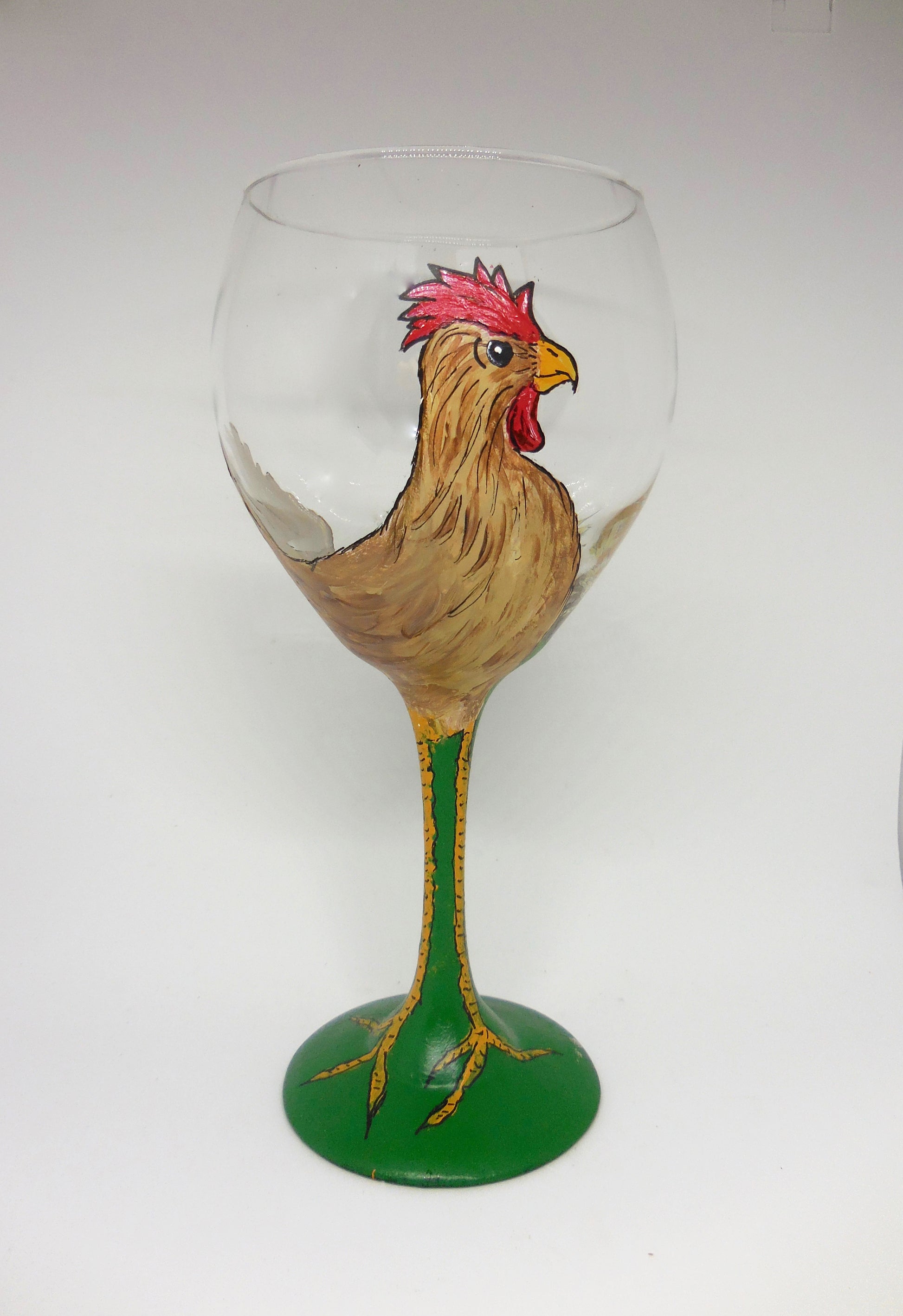 wine glass with grown chicken