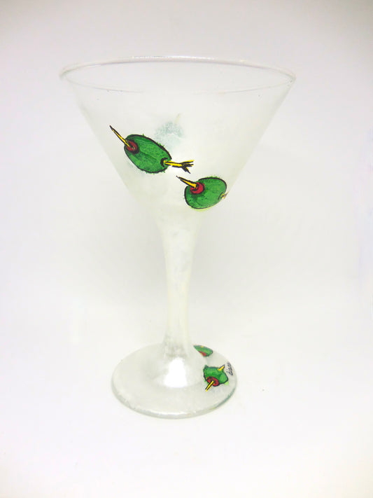 martini glass with olives