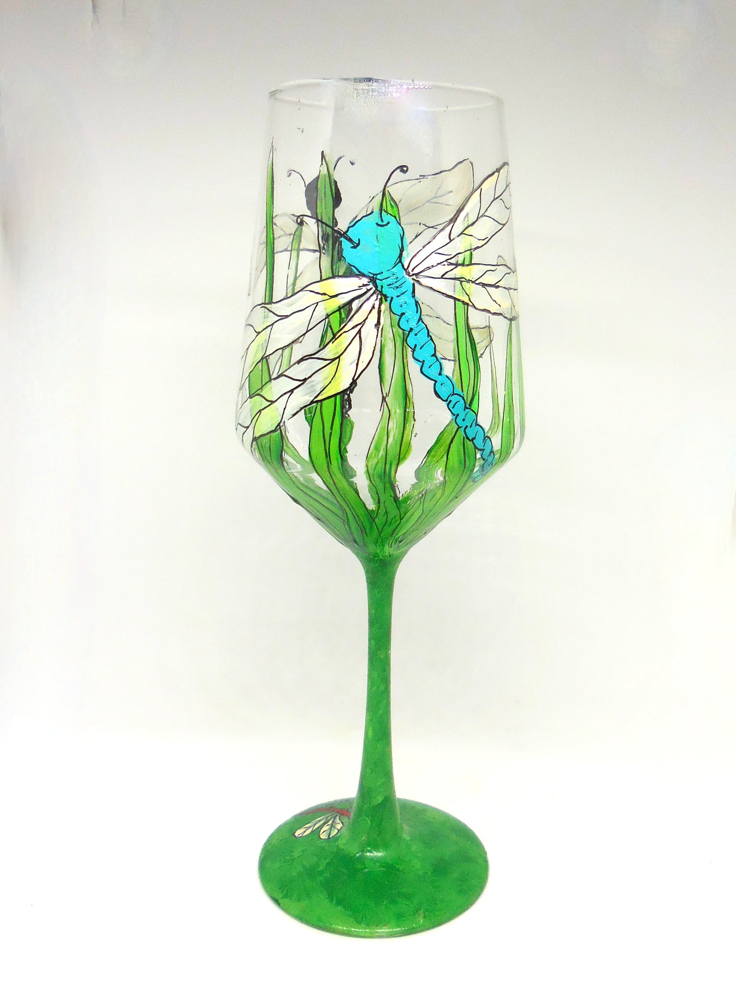 wine glass with blue dragonfly