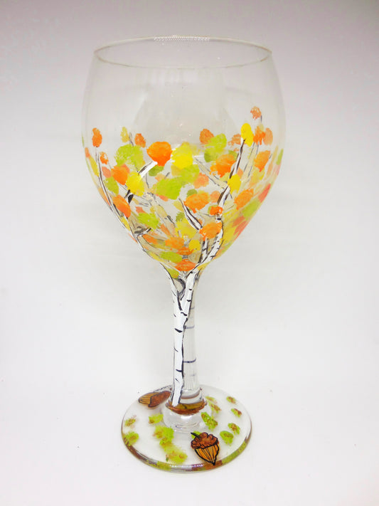 wine glass with fall foliage design