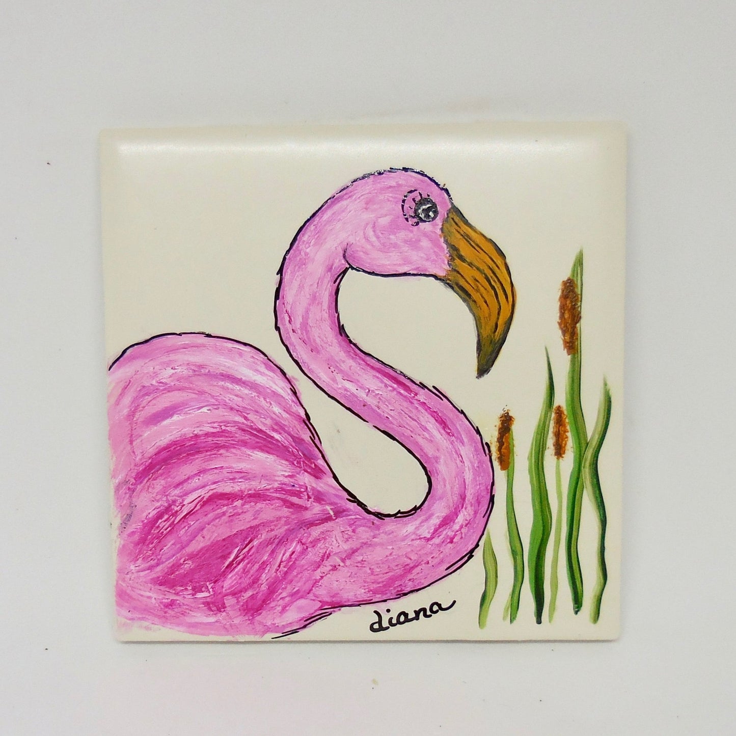 flamingo head on ceramic tile