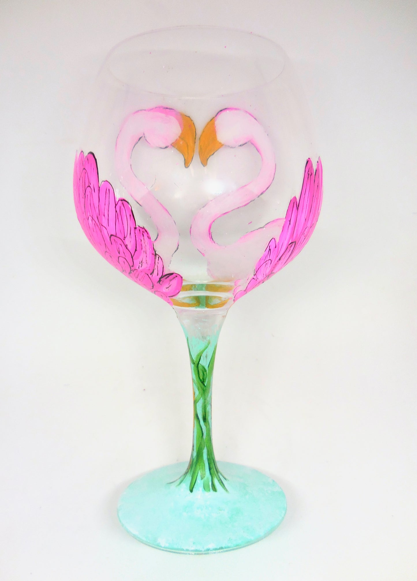 pair of flamingos on wine glass