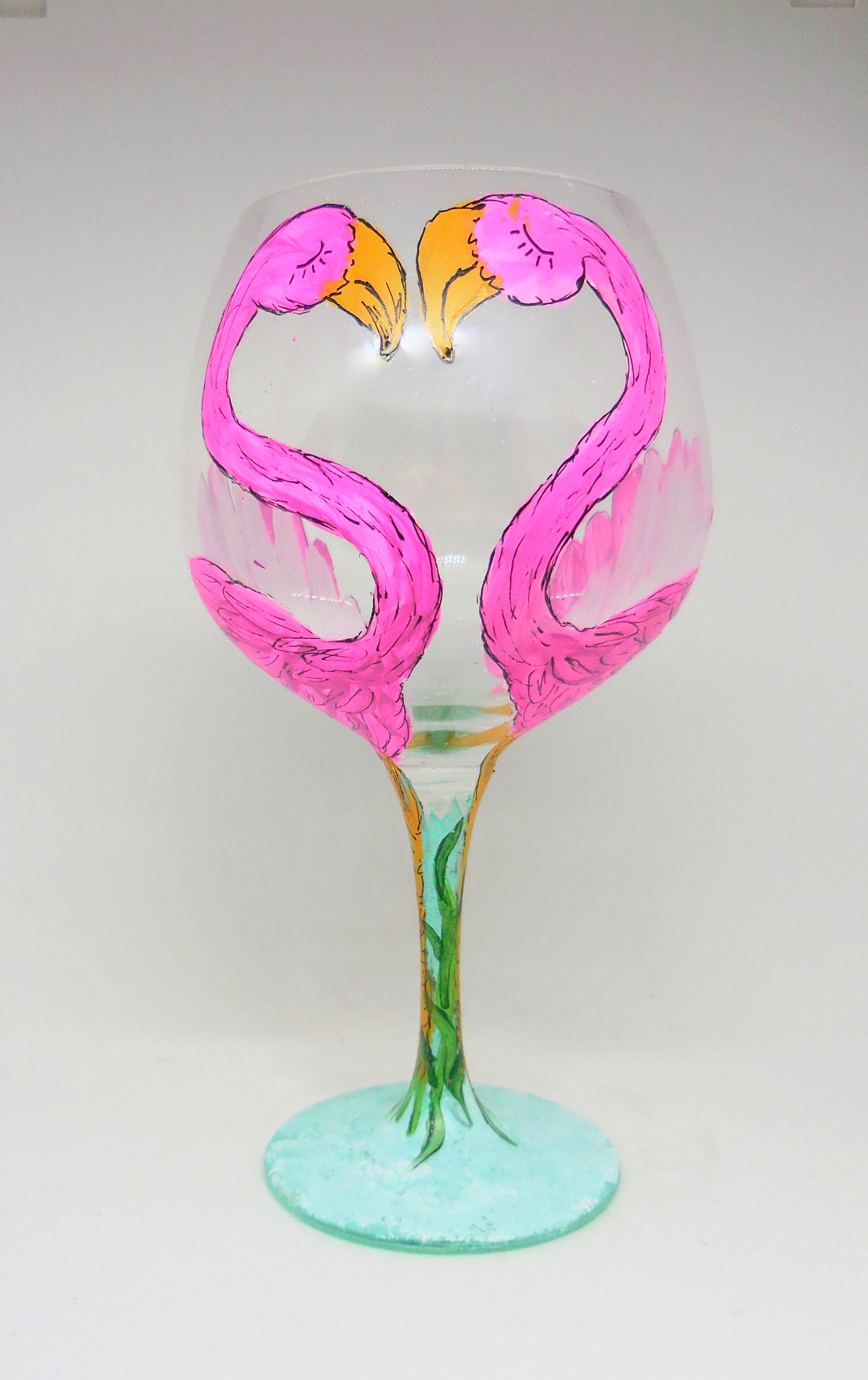 pair of flamingos on wine glass