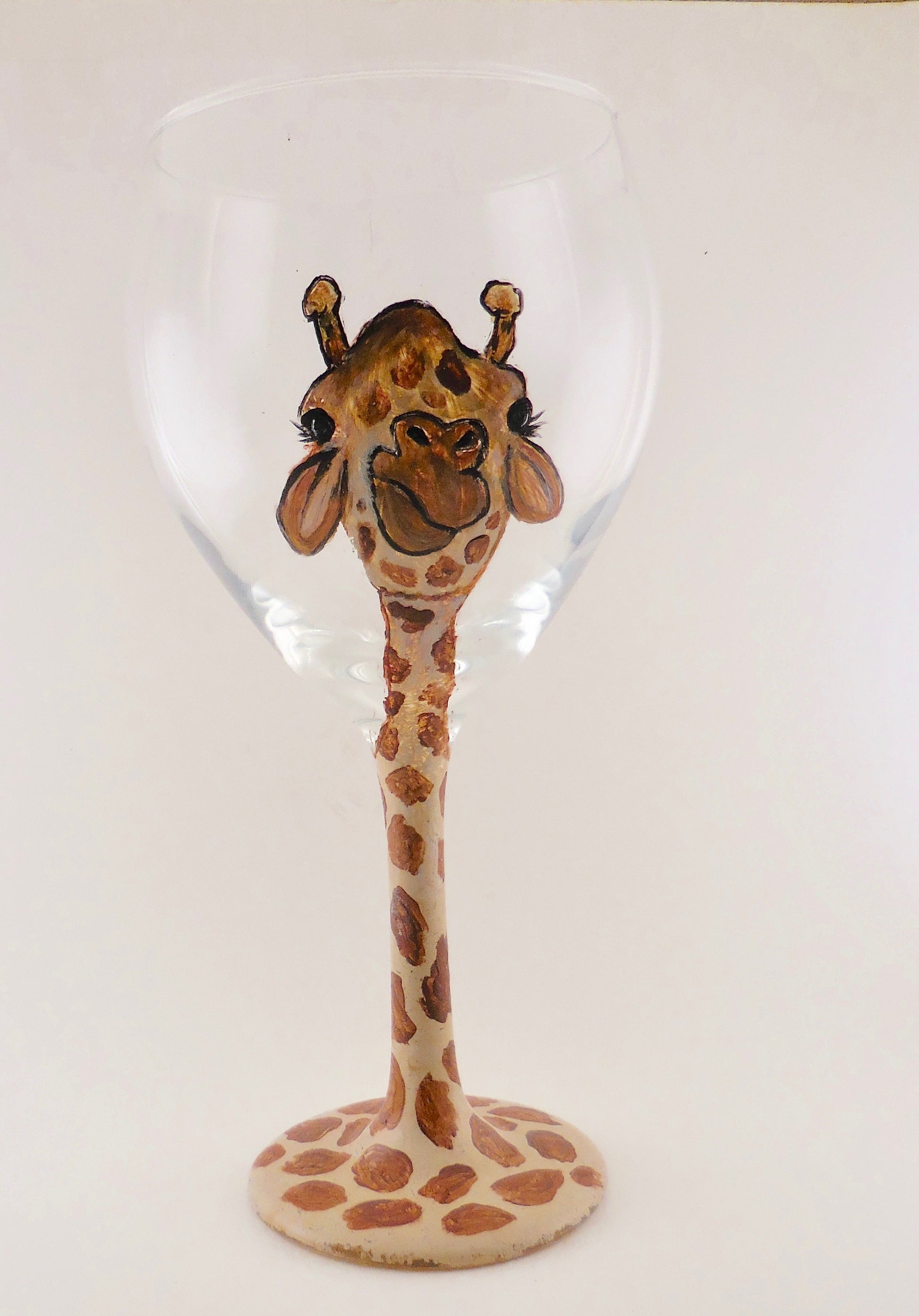 wine glass with giraffe design