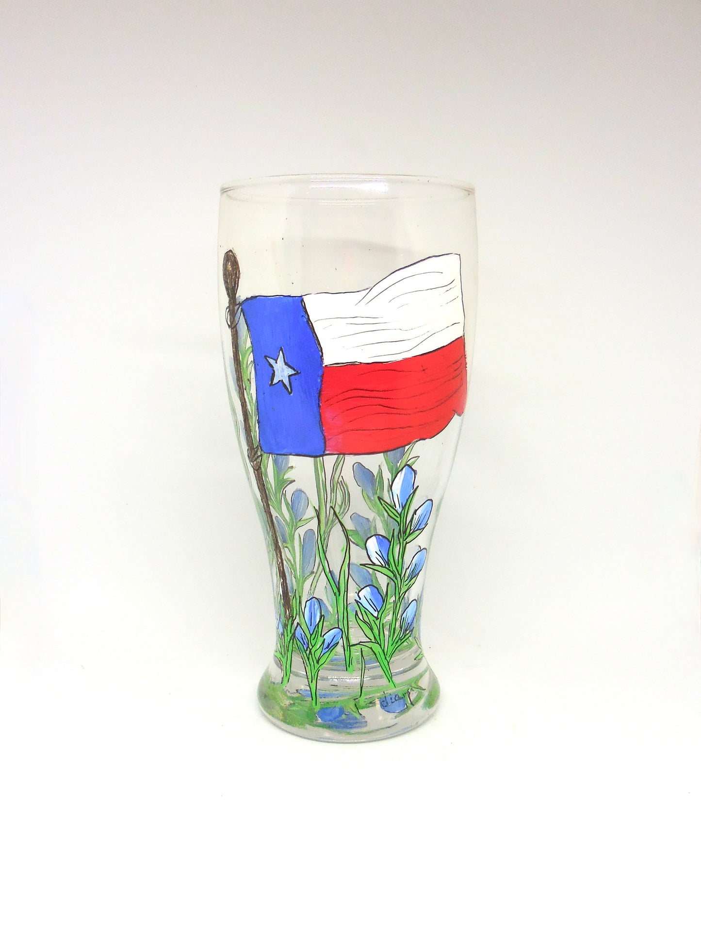 beer glass with bluebonnets and texas flag design