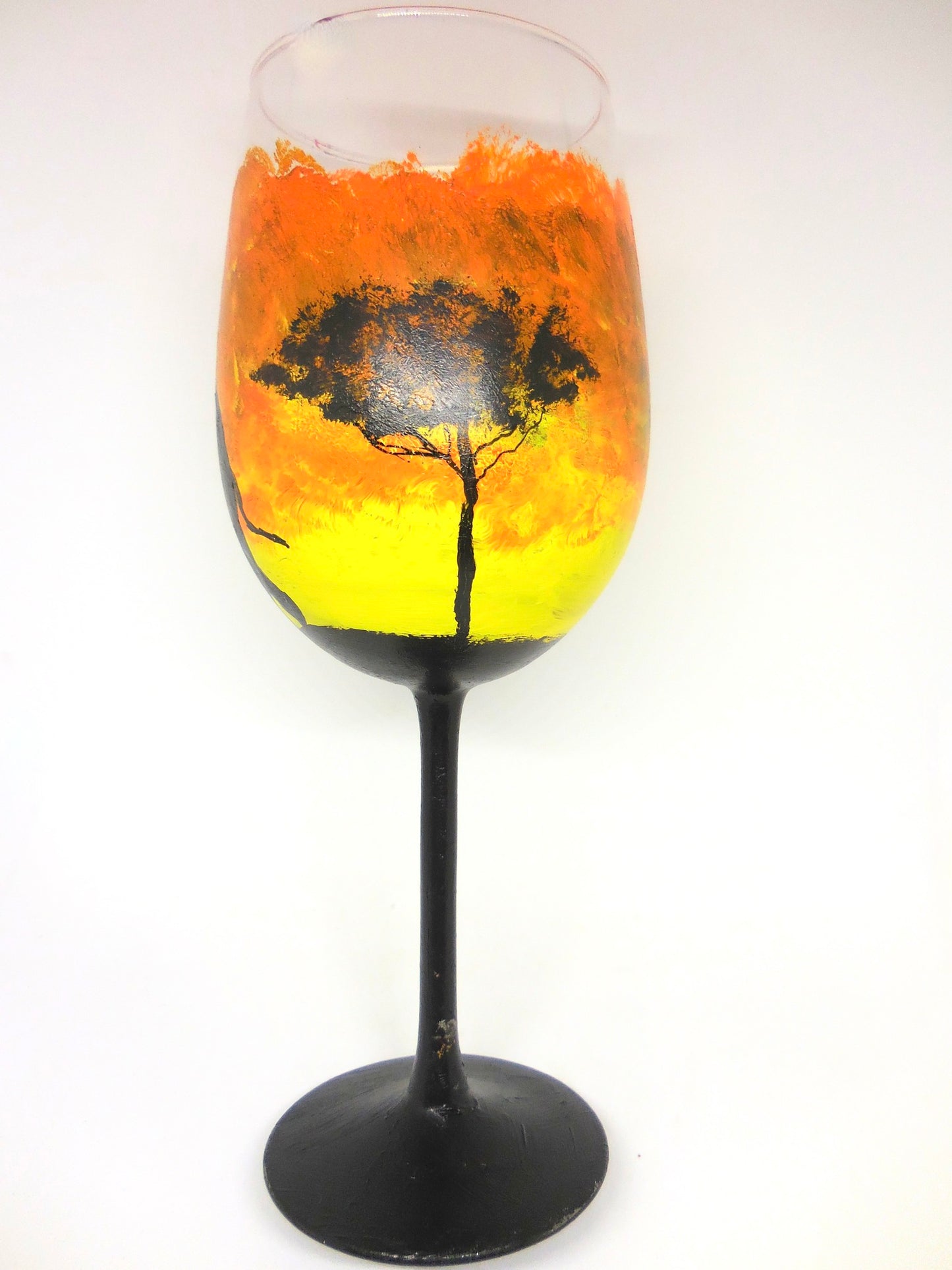 back of wine glass with elephant